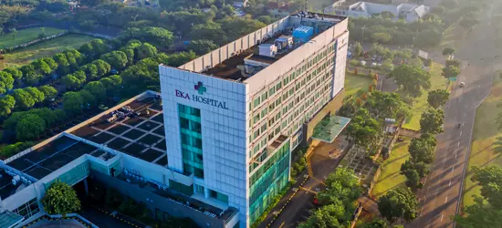 Aerial view of a large, modern hospital building representing a healthcare facility.