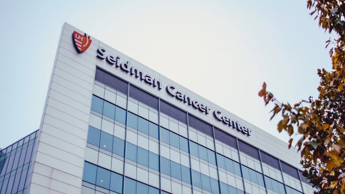 University Hospitals Seidman Cancer Center Exterior Exterior of University Hospitals Seidman Cancer Center in Cleveland, a glass and white-panel building with fall trees